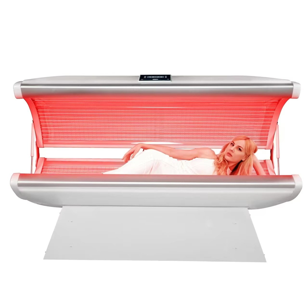 Professional Red Light Therapy Bed with red and infrared light panels illuminated